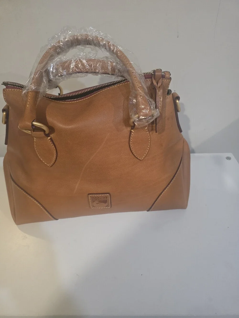 Dooney & Bourke Satchel 30. Color Natural. No Strap( Lost It In Moving).
